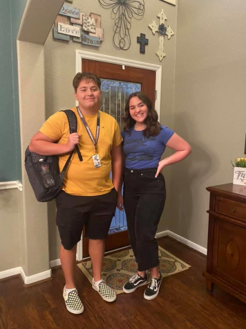 At their home, Lauren (right) and Nick Kern (left) take a picture before heading to their first day of in- person school. They went back to the school building when it reopened August 24, 2020.