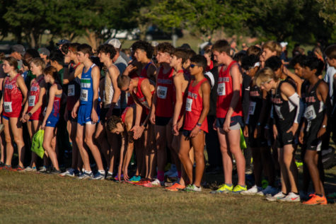 Varsity boys wait anxiously as the race is about to start