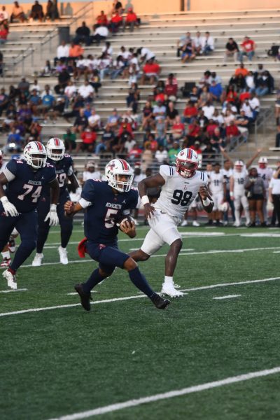  Sophomore Isaiah Rasheed runs in for his first varsity touchdown.
