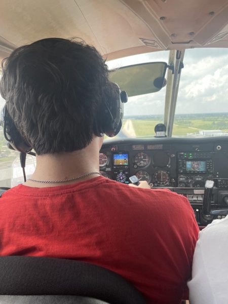 Senior Ethan Poe prepares to embark on a long solo flight.